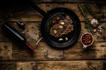 Rib eye steak with wine