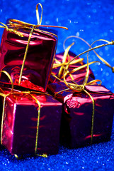 Gift packages on bright blue background