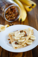 sweet pancakes with bananas and nuts 