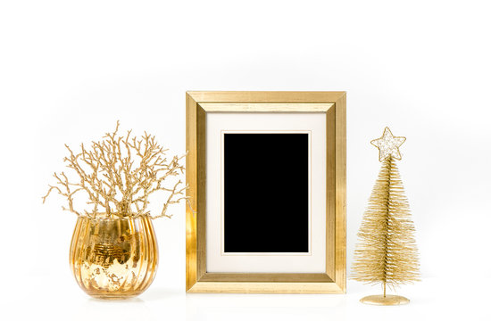 Golden frame and Christmas ornaments. Vintage style mock up