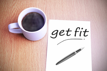Coffee on the table with note writing get fit