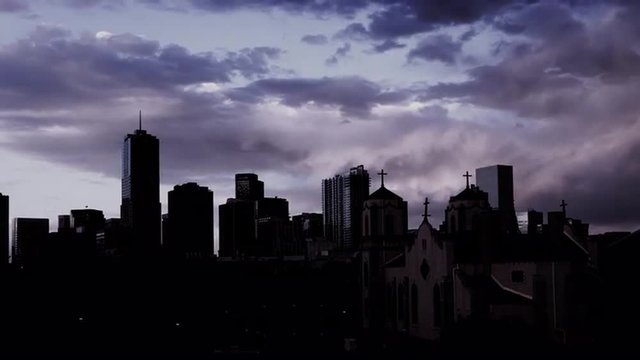 Denver skyline with church and crosses. 4K UHD time lapse.