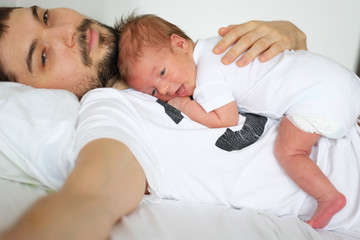 Newborn with his father