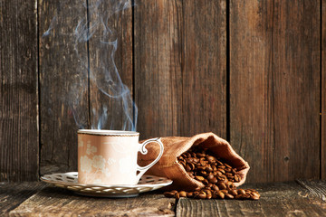 Cup of coffee and coffee beans