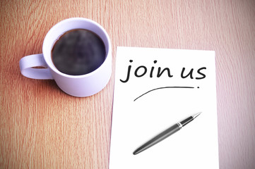 Coffee on the table with note writing join us