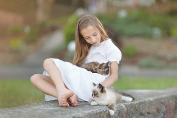 portrait of little girl outdoors in summer