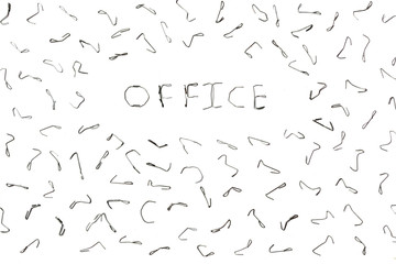Bent staples to fasten papers. The background for your office