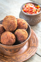 Bowl of meatballs with mexican sauce salsa