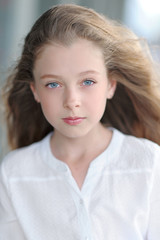 Fototapeta premium portrait of little girl outdoors in summer