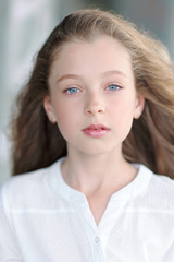 Fototapeta premium portrait of little girl outdoors in summer