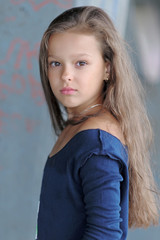 Fototapeta premium portrait of little girl outdoors in summer