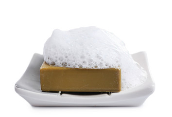 Soap with foam isolated on white