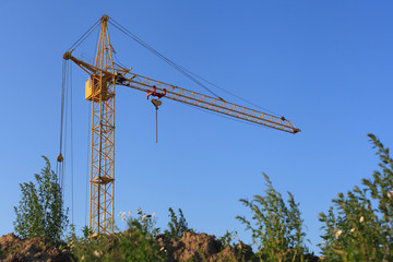 Tower crane. Blue sky