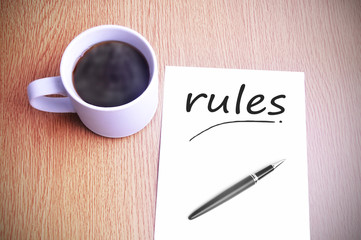 Coffee on the table with note writing rules