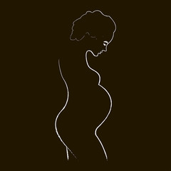 silhouette of a pregnant woman on a black background