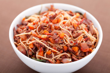 Spaghetti with rabbit and tomatos