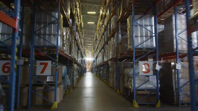 Camera Fly Through Logistics Warehouse Rows of Shelves