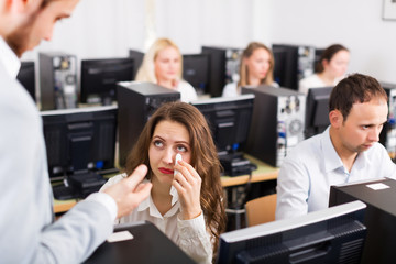 Supervisor scolding despair office worker