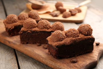 Pieces of chocolate cake on the table, close-up
