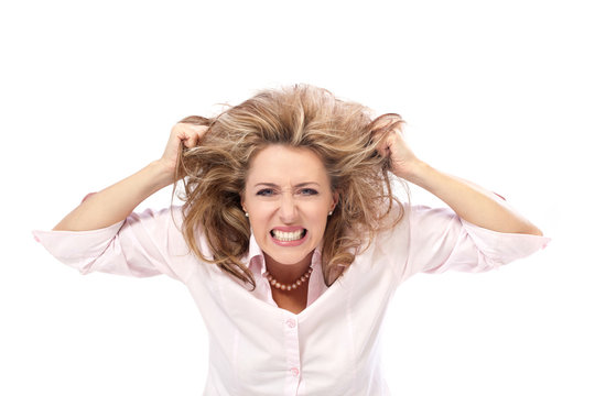 Woman pulling her hair in frustration