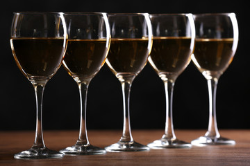 Half full wine glasses on a table