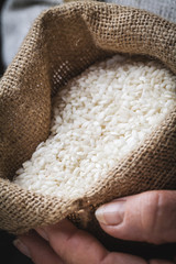 white rice in old hand