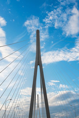 Obraz premium Cables and supports of bridge in china against blue sky