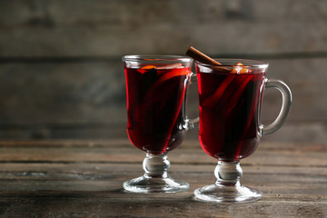 Mulled wine on wooden table