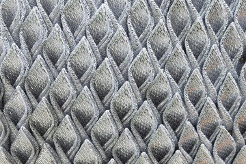 Fold the fabric of the black and silver