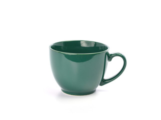green cup on white background
