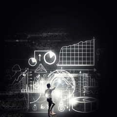 Businesswoman touching icon