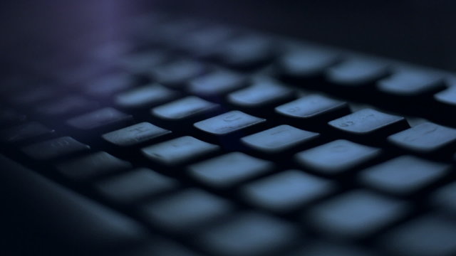 Сlose up computer keyboard. Night theme