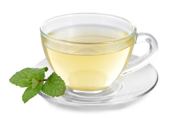 Glass cup of tea with mint leaves isolated on white background