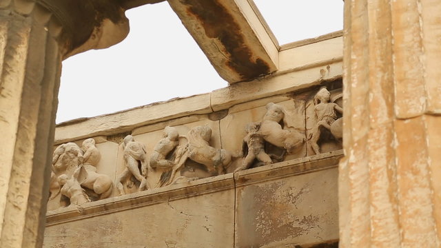 Marble sculpture decoration at ancient building remains, classical architecture