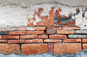 grunge background, red brick wall texture bright plaster wall and blocks road sidewalk abandoned exterior urban background for your concept or project