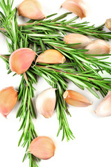Naklejka na ściany i meble Garlic with rosemary isolated on white