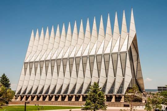 Mostly White Modern Chapel Against Blue Sky