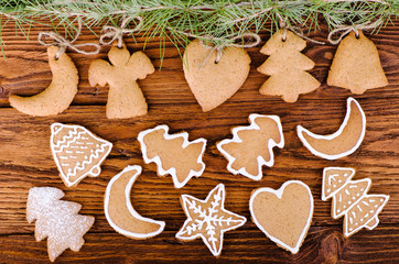  gingerbread cookies on a wooden background