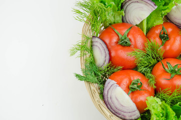 A whole tomato and chopped onion