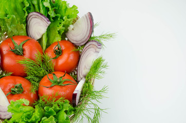 A whole tomato and chopped onion