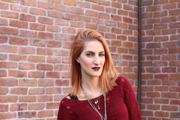 Androgynous Young Woman with Red Hair
