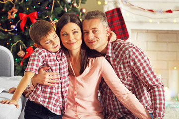 Christmas family portrait in home holiday living room