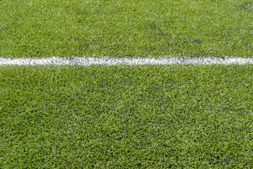 Line For laying an artificial turf football field.
