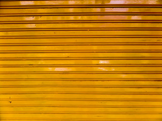 Naklejka premium roller shutter door and dark yellow