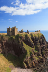 Dunnottar Castle with blue sky in - Stonehaven, Aberdeen, Scotland