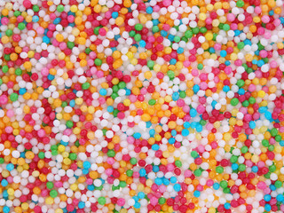 Fototapeta na wymiar Tiny coloured decorative candies