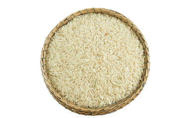 brown rice on bamboo basket isolate on white