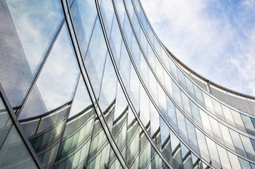 Fototapeta na wymiar Modern glass round shaped office building