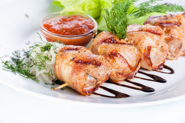 Russian skewers with parsley, onion and lettuce on a white background
