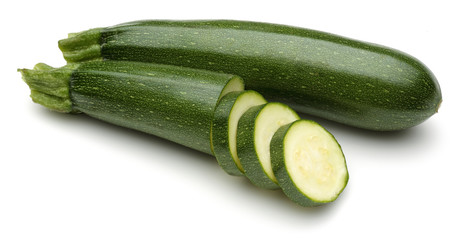 Fresh zucchini and sliced zucchini